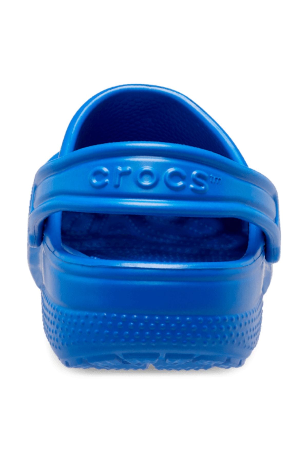 Bright blue Crocs Classic Kids Clog shown from the back, highlighting the heel strap with the "Crocs" logo and a textured sole for comfort.