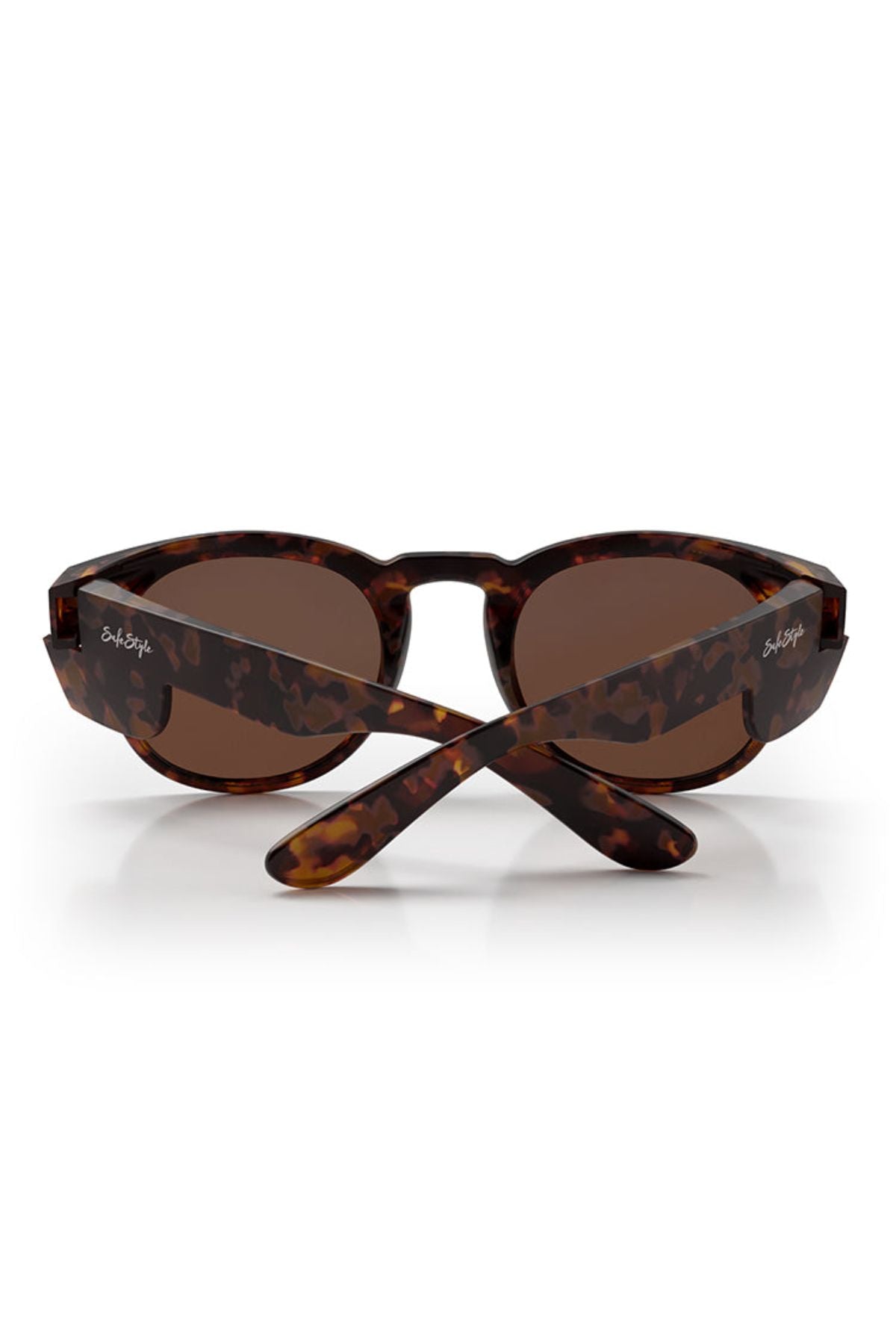 SafeStyle Cruisers Matte Brown Tort Frame sunglasses with brown polarised lenses, UV400 protection, and silver logo on the arms. Shown from the back with crossed arms.