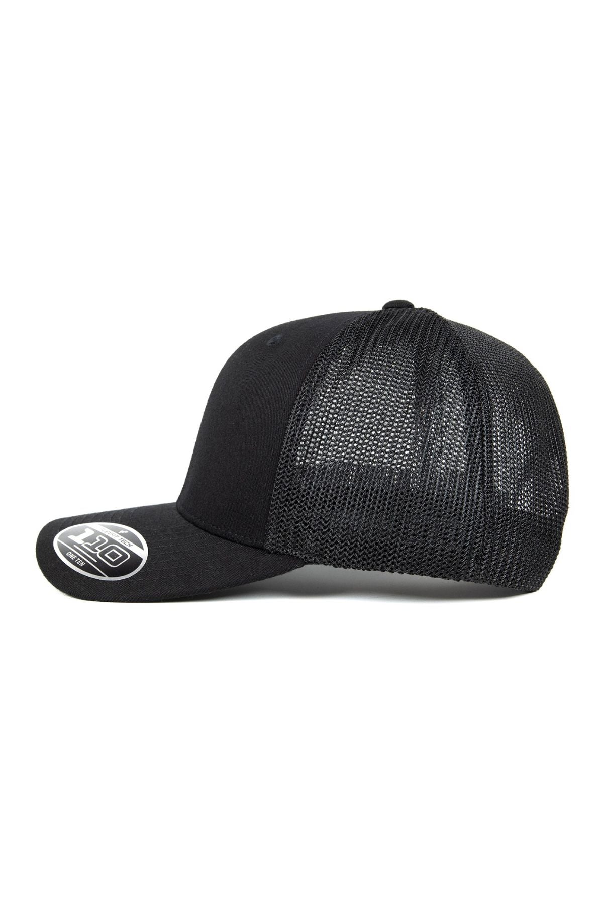 The FlexFit MT Mesh Trucker Cap, shown from the side against a white background, features a black mesh back for breathability, a flat bill with a sticker on the brim.