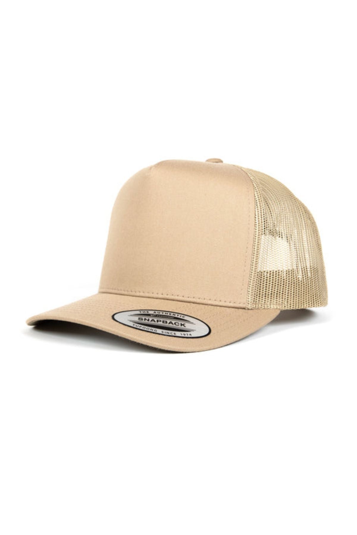 The FlexFit Trucker Cap is a beige cap with a solid front panel, mesh back, curved brim, and an adjustable snap back sticker on the bill.