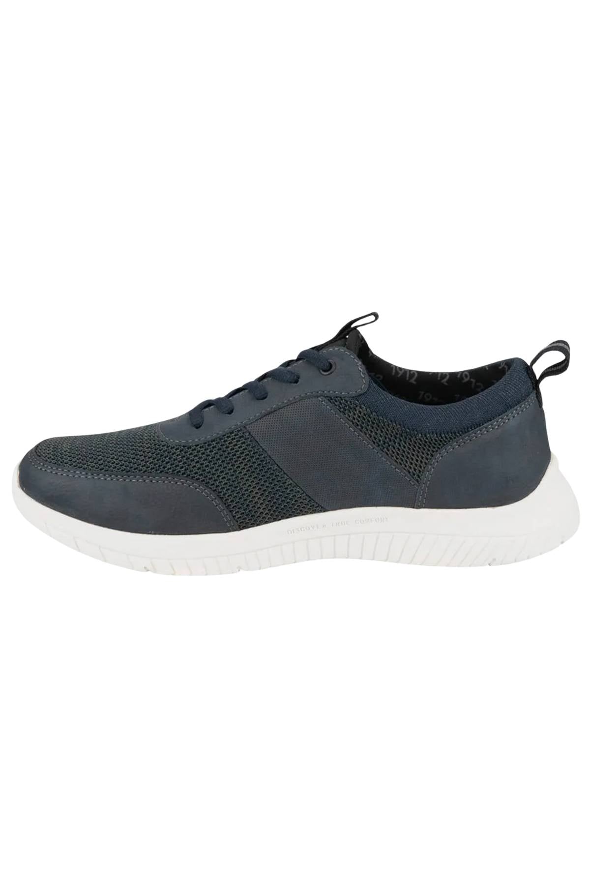 The Florsheim Kore City Pass Sneaker is dark blue with mesh and suede-like panels, a white rubber sole, black laces, pull tabs on the tongue and heel, and an algae-based footbed for comfort.