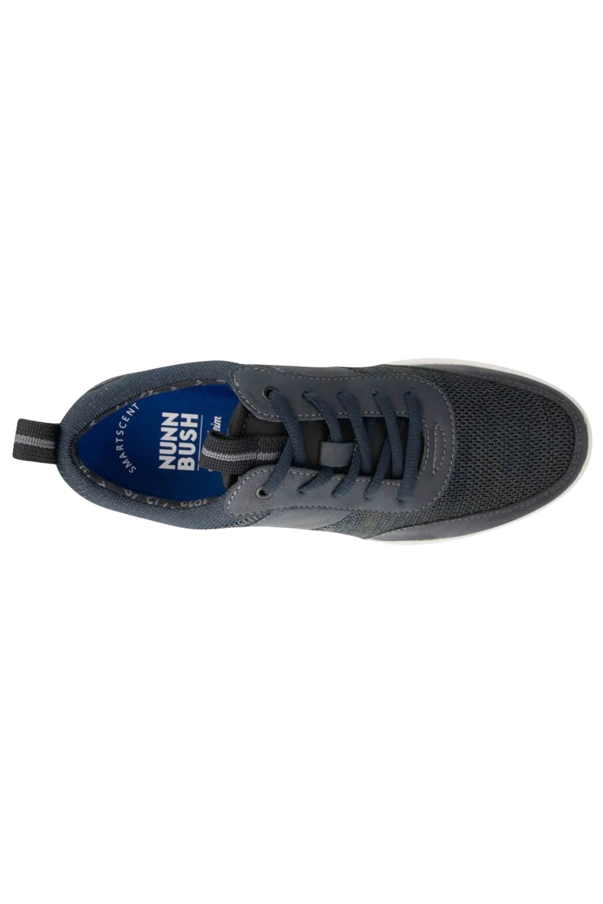 Top view of the Florsheim Kore City Pass Sneaker, featuring a dark blue design with black laces, white sole, Comfort Gel heel pod, pull tab, and a "Florsheim" branded insole in white text on a blue background.