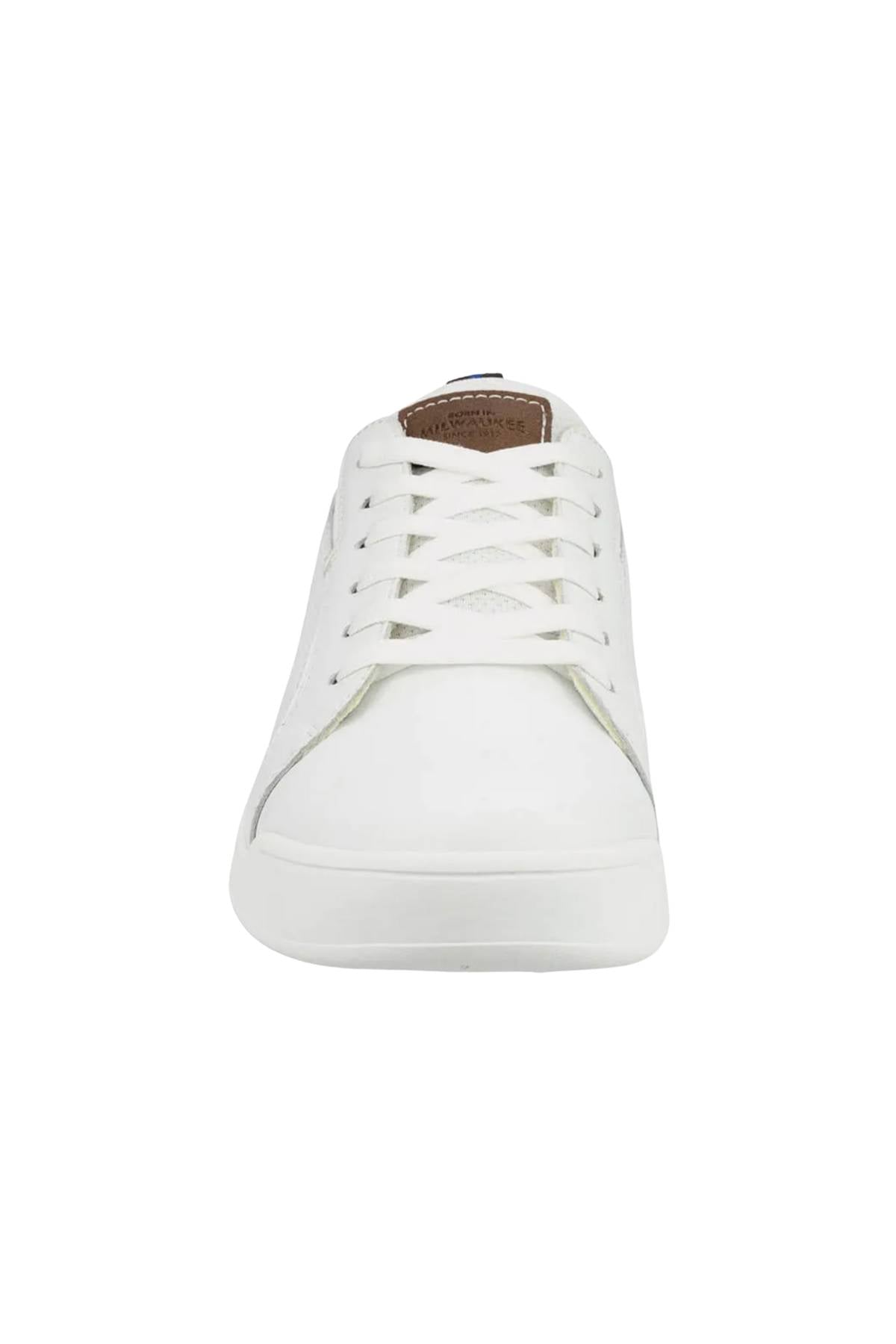 Front view of the Florsheim Kore Tour Lace Sneaker in white, featuring white laces, a brown tongue patch, lightweight EVA sole, and genuine leather construction, shown isolated on a white background.