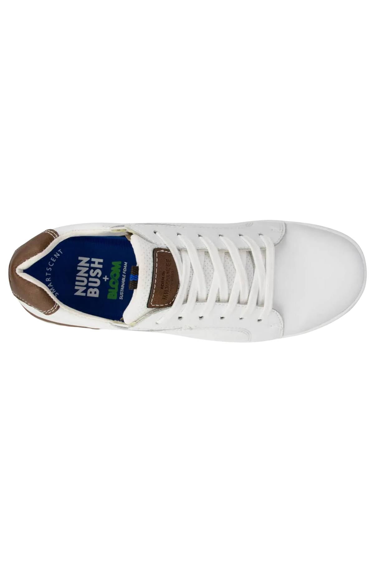 A top-down view of the Florsheim Kore Tour Lace Sneaker for men, crafted in white genuine leather with brown heel and tongue accents, white laces, a blue logo insole, and a lightweight EVA sole.
