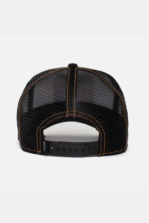 The image showcases the back view of Goorin Bros' The King Lion Cap, a black mesh trucker hat that includes orange stitching and an adjustable snapback closure.