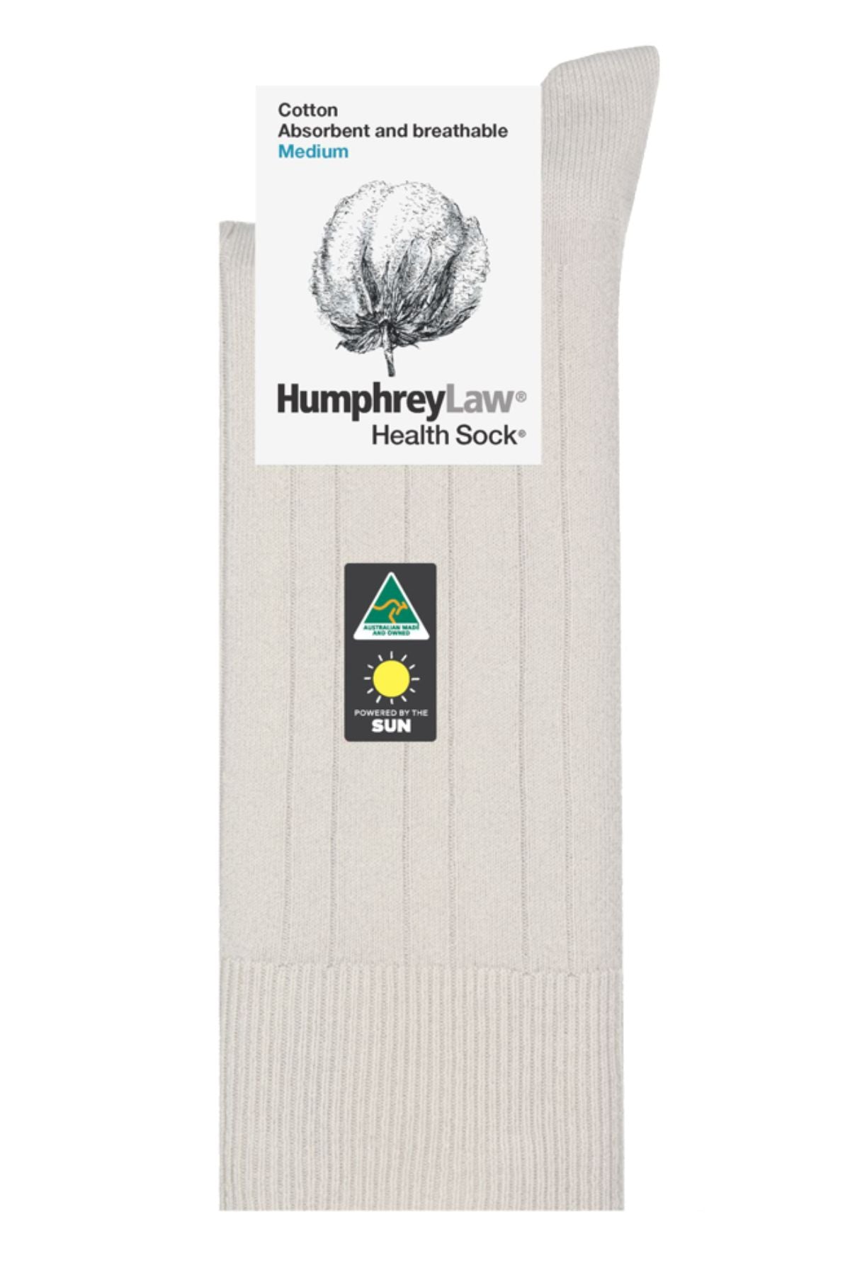 A beige ribbed Humphrey Law Pure Cotton Sock, made in Australia, features a cotton flower label with "Cotton, Absorbent and breathable, Medium," “HumphreyLaw Mens Health Sock,” a sun logo, and a green triangle symbol.