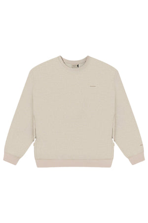The Industrie The Tech Del Sur Sweat is a light beige crewneck sweatshirt with long sleeves, ribbed cuffs and hem, made from breathable fabric and shown flat on a white background.
