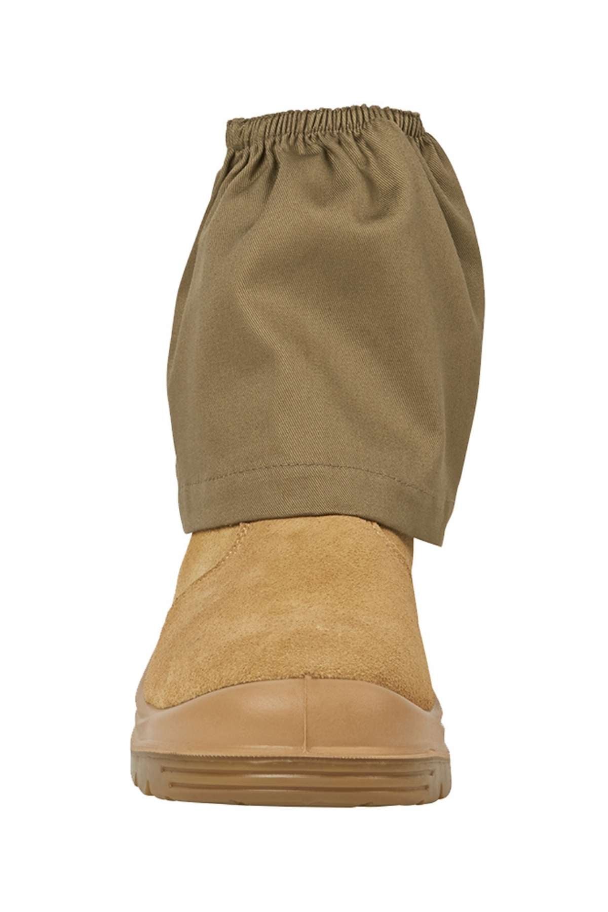 The JBs Boot Cover, made from khaki cotton drill with an elastic top, serves as a dust cover and boot protector, fitting over the ankle and lower leg of a tan suede boot with a rugged sole.