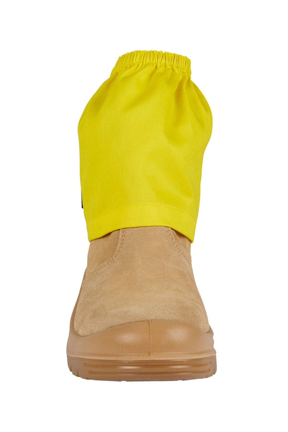 A tan work boot with a JBs Boot Cover, a bright yellow cotton drill protector, secured around the ankle and photographed from the front against a white background.