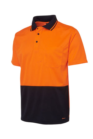 The JBs Hi Vis Non Cuff Traditional Polo is a short-sleeved, 100% polyester shirt with an orange top, black bottom, black collar, three buttons, and a left chest pocket.