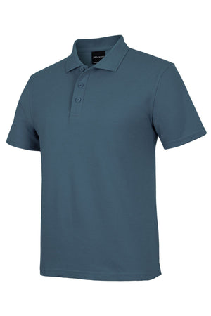 The JBs Short Sleeve Polo is a teal, short-sleeved shirt with UPF protection, a collar, and three-button placket, shown on a white background.