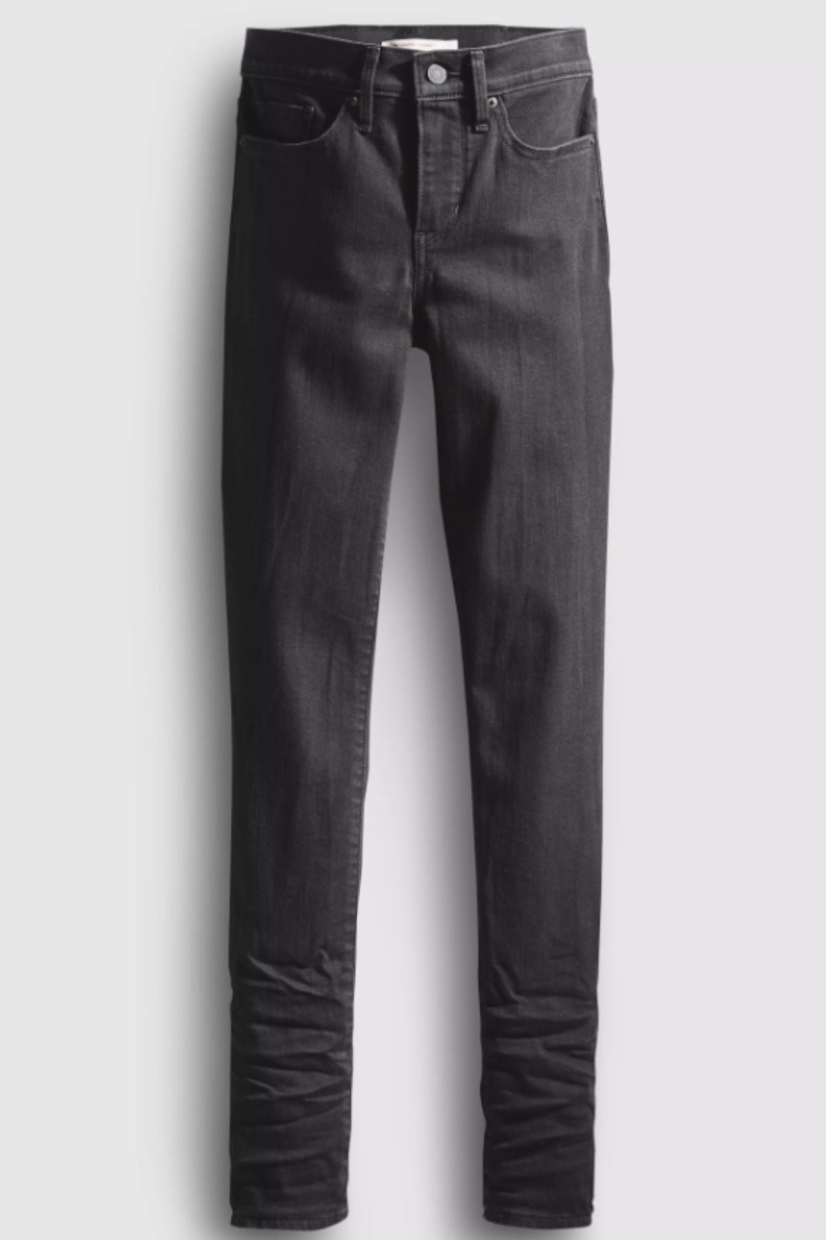 Levis 311 Shaping Skinny Jean in black stretch denim with tummy control, front and back pockets, button closure, and visible seams, displayed flat on a light background.