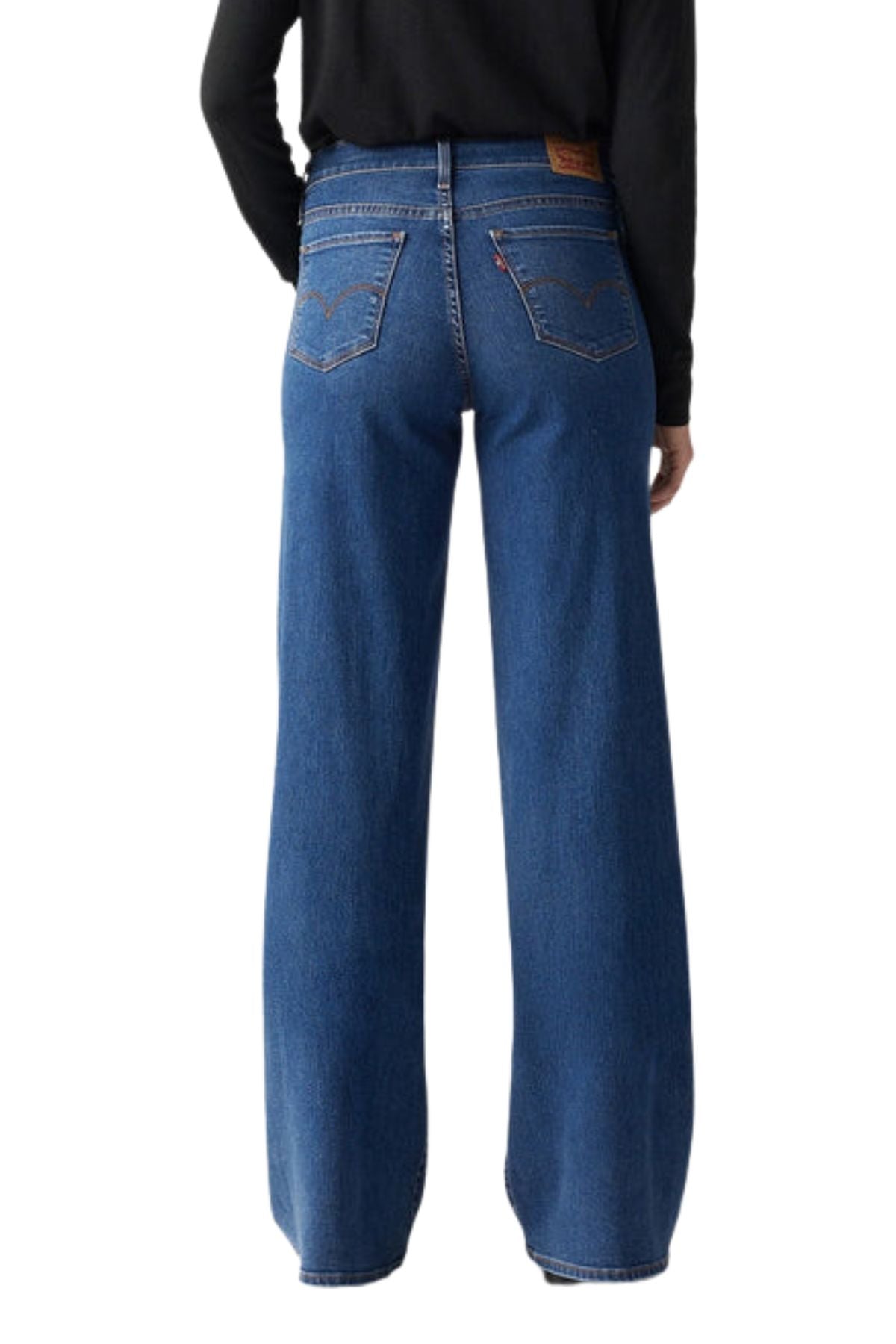 A person wearing Levis 318 Shaping Wide Leg Jean and a black long-sleeve top is shown from the back against a white background.