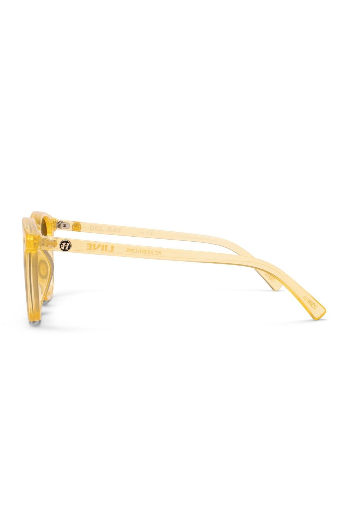 Side view of Liive Del Ray Polarised Sunglasses featuring a translucent yellow square wayfarer frame and slightly curved arms, shown against a plain white background.