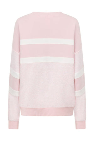 The Lorna Jane Dreamer Oversized Sweat is a light pink sweatshirt with white horizontal stripes on the back and sleeves. Made from soft cotton-blend terry, it features an oversized fit, crew neckline, ribbed cuffs, and hem.