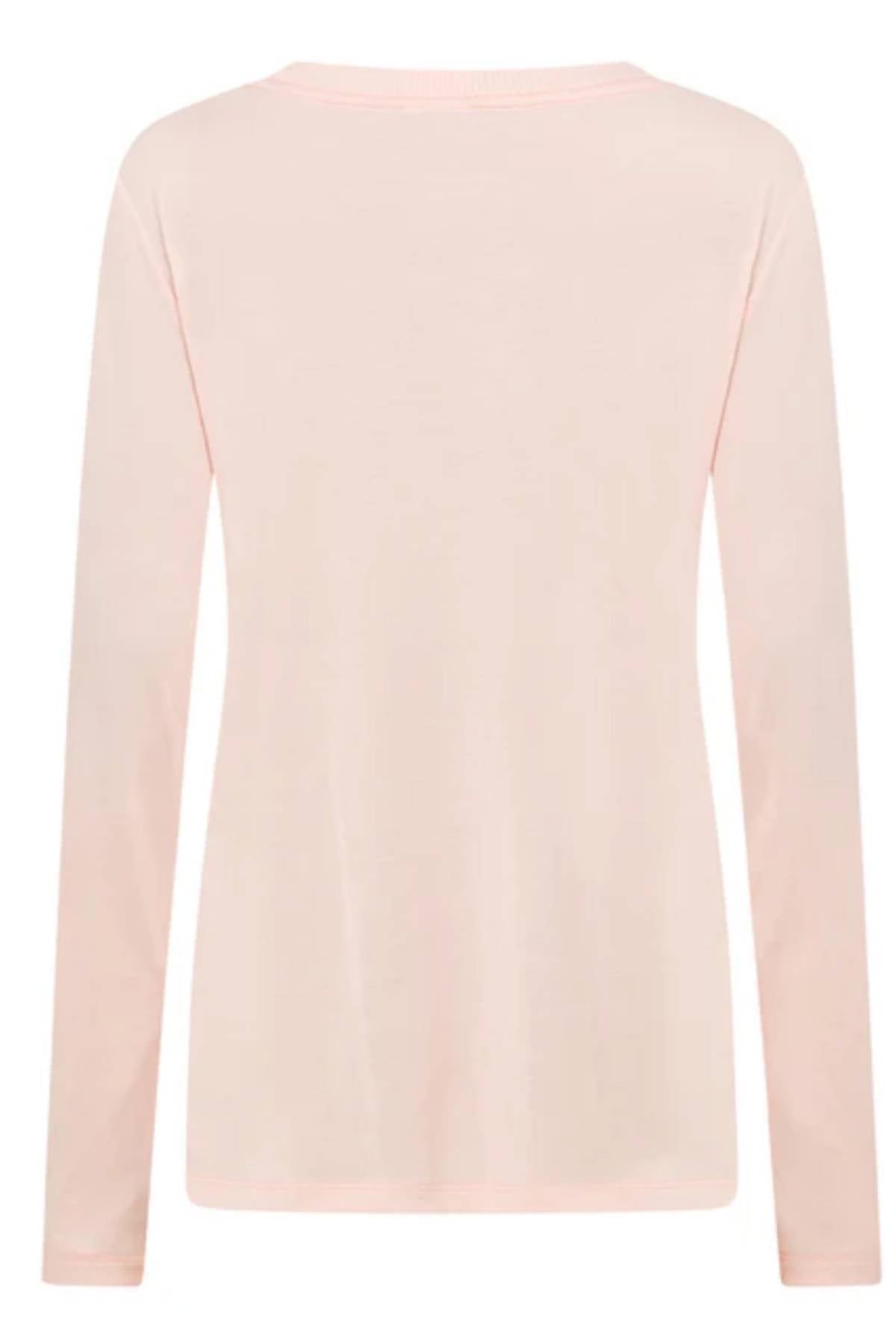 The Lorna Jane Lotus Long Sleeve Top in light pink is shown from the back against a white background. This plain shirt features a simple, unadorned design that's perfect for lightweight layering.
