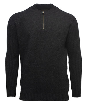 The MKM Mount Possum Wool 1/2 Zip Knit is a dark gray, long-sleeved sweater featuring a ribbed texture. Made from Merino wool, it boasts a high collar with a short, central zipper extending down from the neckline, adding a casual element to the design. Made in New Zealand, this comfortable jumper has a fitted yet cozy appearance.
