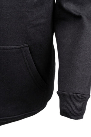 Close-up of the Outback Comfy Graphic Hoodie, showing the lower pocket, a ribbed sleeve cuff, and part of its screen-printed graphic design on a white background.