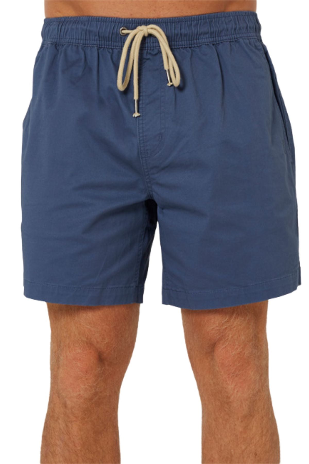 A person wearing Pilbara Cotton Stretch Shorts in blue with a beige drawstring and elastic waist, shown from the lower torso to upper legs against a plain white background.
