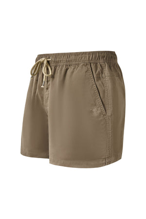 The Pilbara Cotton Stretch Short in tan features an elastic waistband, drawstring tie, side pockets, and a small embroidered logo on the left leg, shown on a white background.