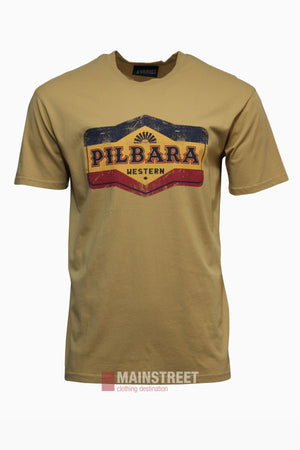 A tan Pilbara Oil Can T-Shirt with a relaxed fit, featuring a vintage-style "PILBARA WESTERN" chest graphic in blue, red, and yellow. Displayed on a white background—celebrate regional pride in effortless style.