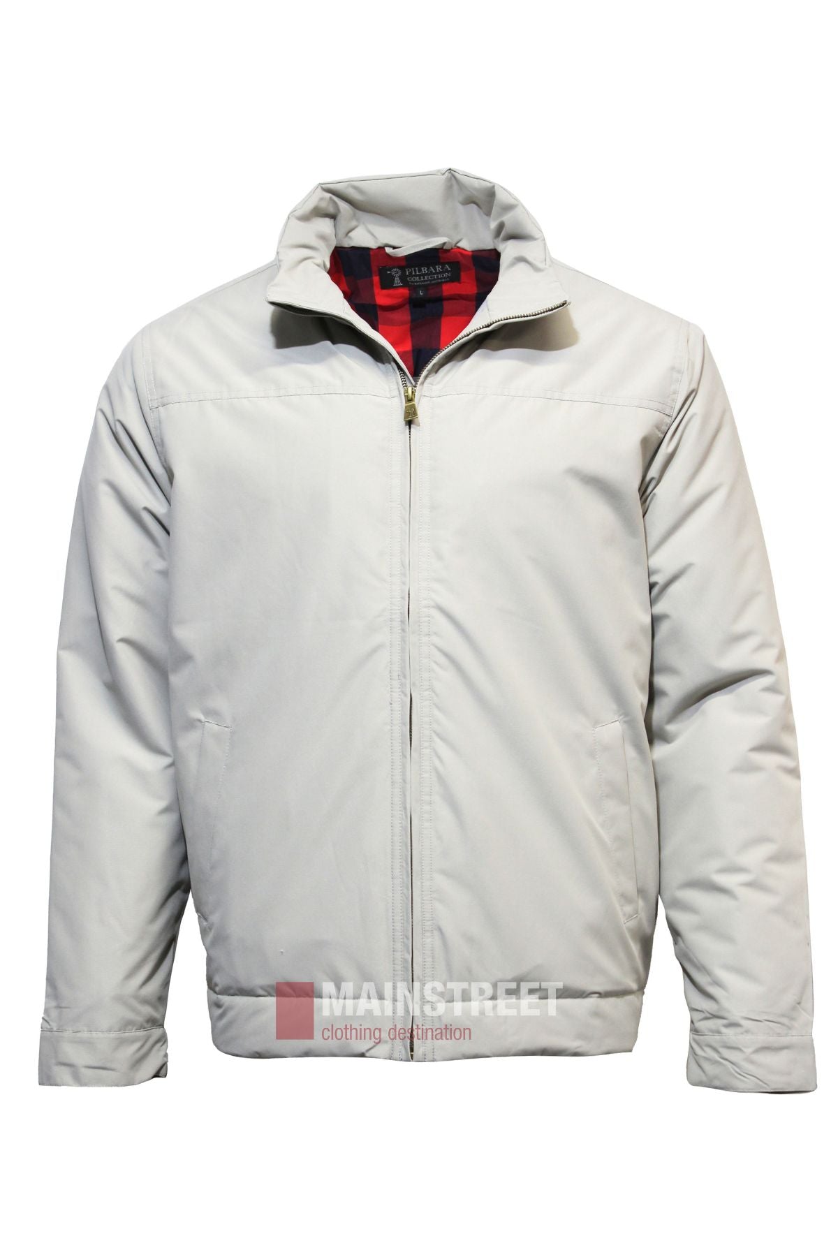 The Pilbara Quilted Jacket is a light gray zip-up with a stand-up collar, long sleeves, and plaid lining at the collar. It features two side pockets and a clean, comfortable design.