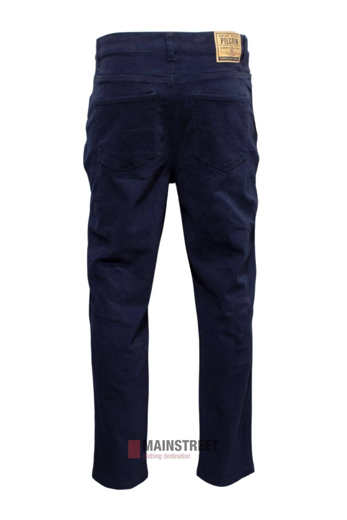 Back view of Pilgrim Moleskin Jean in dark blue, regular fit with stretch, featuring two rear pockets and a tan leather patch on the waistband. Displayed on a white background with the "MAINSTREET" logo at the bottom.