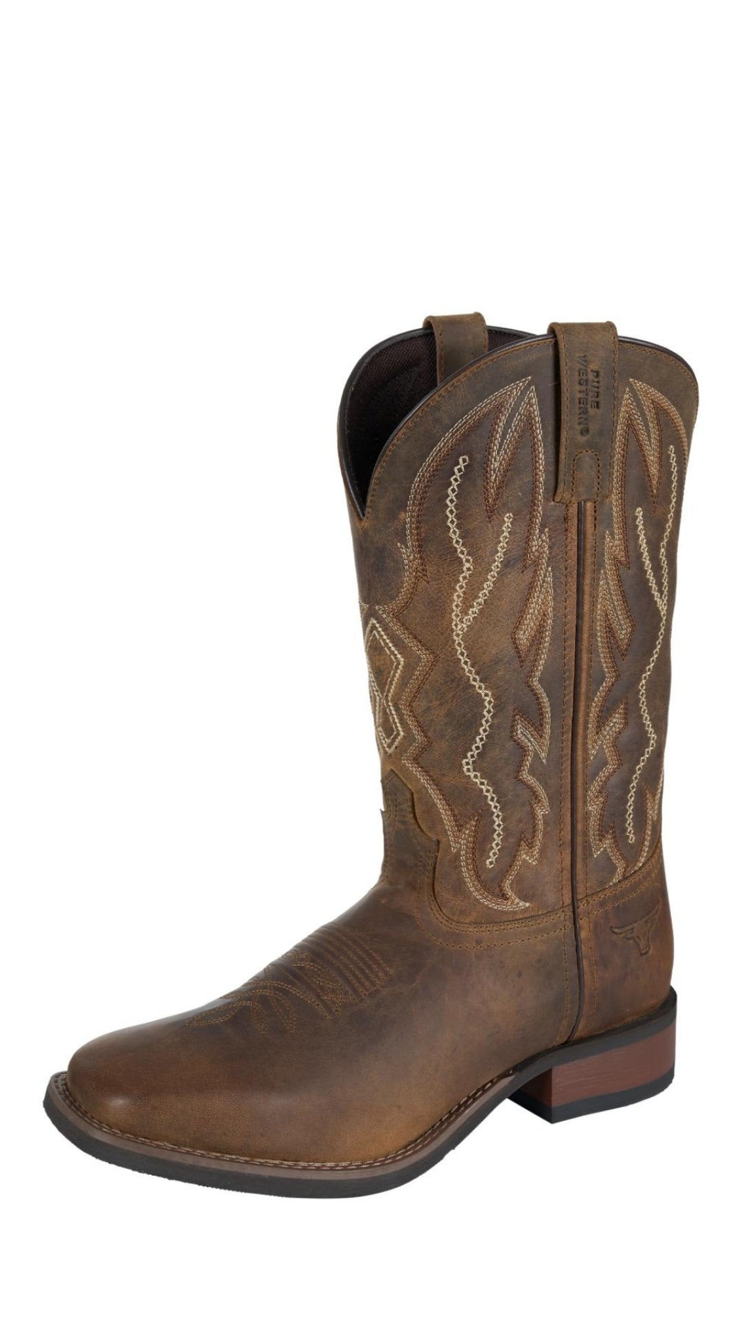 The Pure Western Tolar Boot is a single brown boot made from grained leather, featuring decorative stitching, a square toe, and a low stacked heel, displayed against a white background.