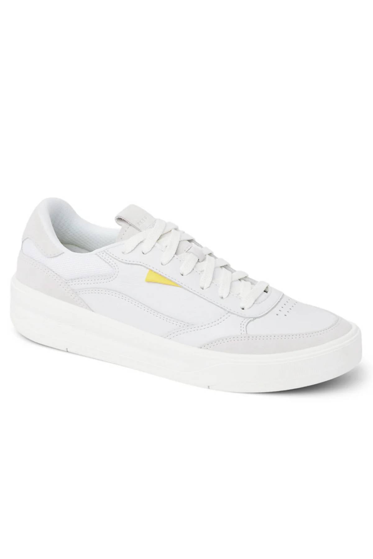 The Reef Bom Dia Shoe is a white low-top with white laces, white sole, and a yellow accent near the side logo. It features a cushioned footbed for all-day comfort and is displayed on a plain white background.