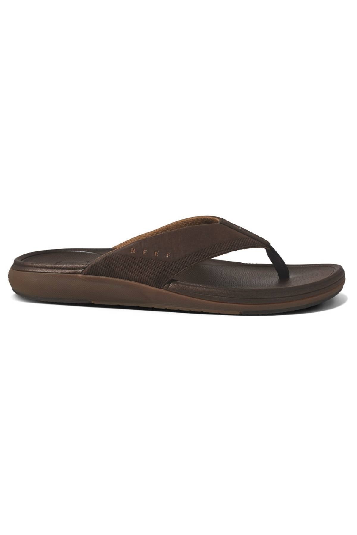 The REEF Cushion Norte is a brown flip-flop sandal with an EVA foam cushioned sole and a textured thong strap, shown in side profile on a white background.