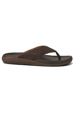 The REEF Cushion Norte is a brown flip-flop sandal with an EVA foam cushioned sole and a textured thong strap, shown in side profile on a white background.