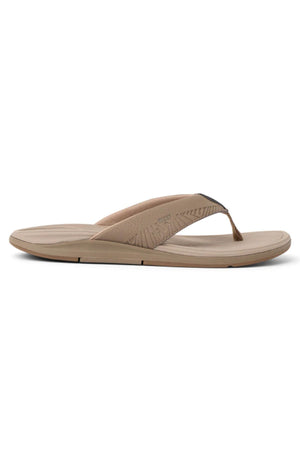 The REEF Offshore is a tan flip-flop sandal with a cushioned sole and wide fabric strap, shown in side profile on a white background—ideal for anyone seeking comfortable memory foam sandals from REEF shoes.