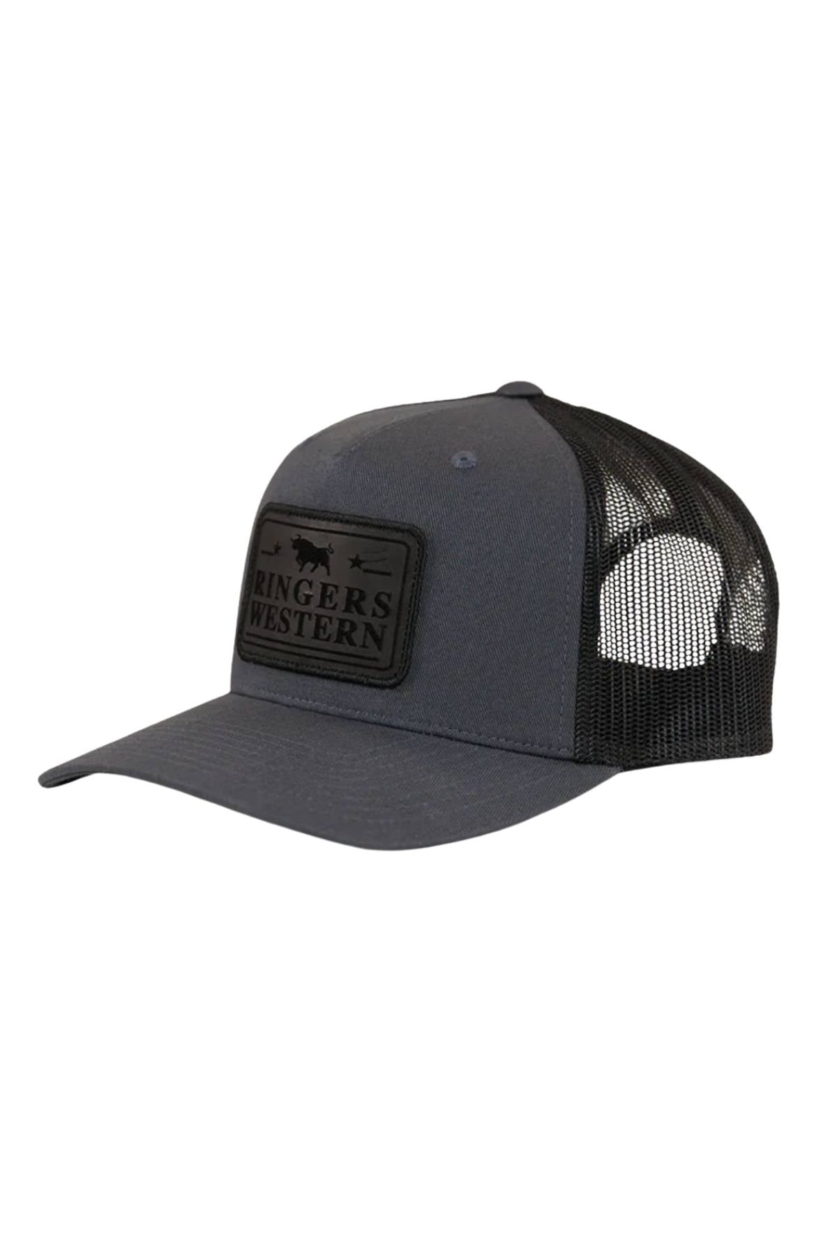 The Ringers Western Awol Trucker Cap is dark grey and black, features a mesh back, snapback closure, and a front patch with "Ringers Western" in black lettering.