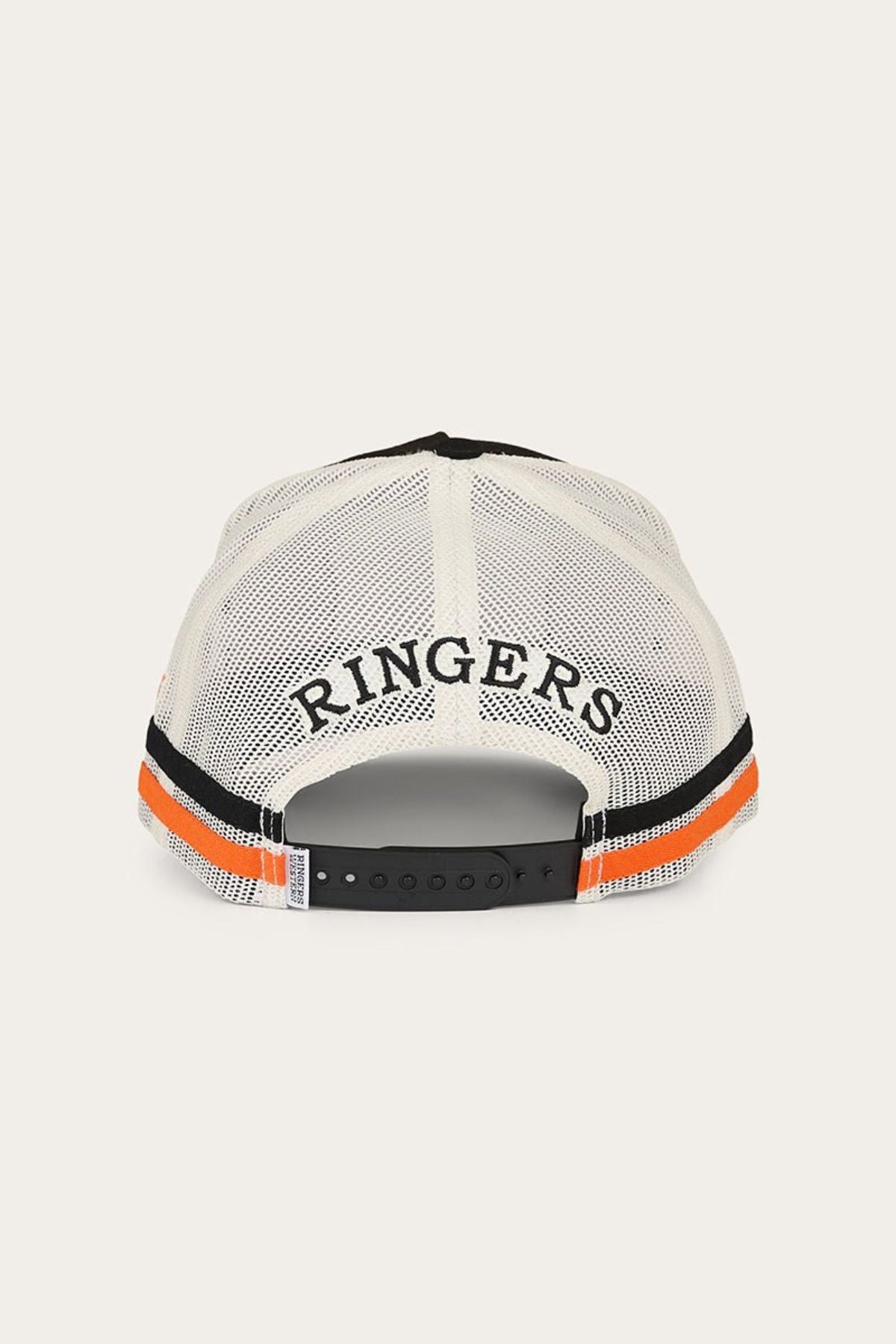 The Ringers Western Big Buck Deep Fit Trucker Cap is a classic outdoor cap style, featuring a white mesh back with the word “RINGERS” in black letters, an adjustable black strap, and distinctive black and orange stripes above the strap. Designed for comfort and versatility, this cap offers a deep fit trucker cap design.