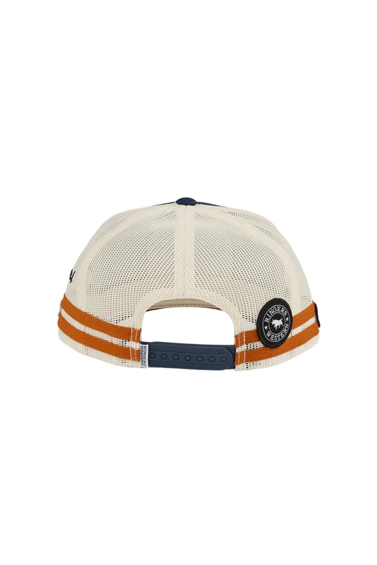 Back view of the Ringers Western Big Rig Trucker Cap, featuring a cream color with orange stripes, blue adjustable snapback, mesh back panels, and a circular black patch on the left side.