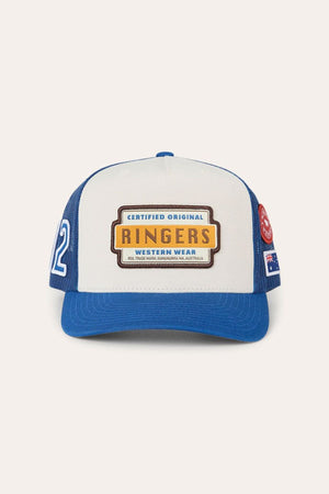 The Ringers Western Drive By Deep Fit Trucker Cap is a white and blue trucker hat with a mesh back for excellent sun protection. It features a yellow “Ringers Western Wear” patch on the front, an embroidered “22” on the left side, and an Australian flag patch on the right. Its deep fit design ensures comfortable wear all day long.