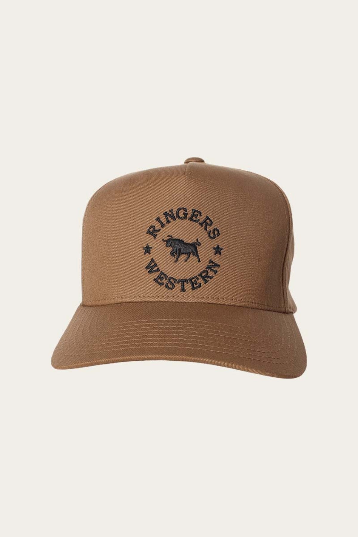 The Ringers Western Icon Baseball Cap is a brown cotton twill baseball cap featuring the words "Ringers Western" and a cow logo embroidered in black on the front. The cap has a simple and structured design with an adjustable strap for a perfect fit.