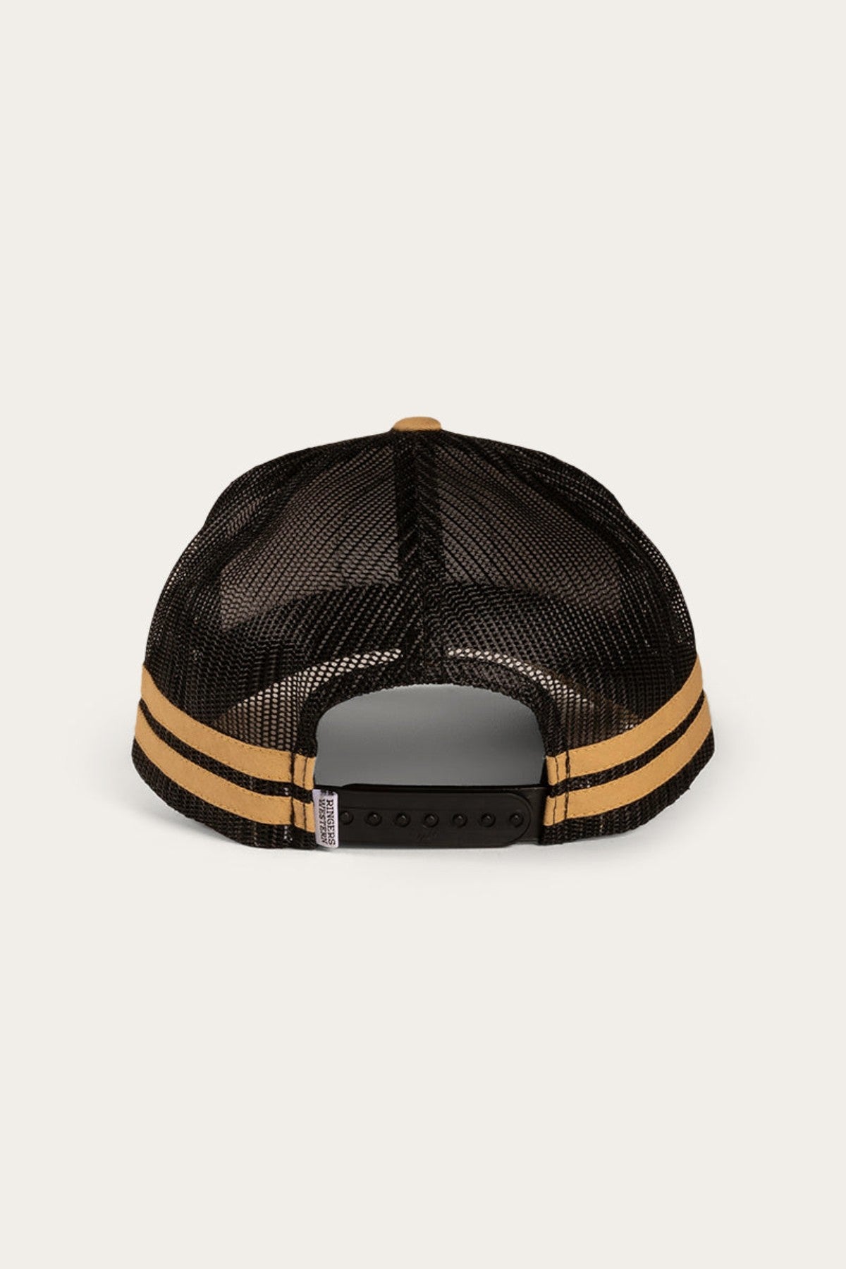 Back view of the Ringers Western McCoy Trucker Cap, showcasing a black mesh with an adjustable strap closure. Twin yellow stripes run parallel along the lower part of the mesh, and a small tag with text is visible on the left side near the snapback.