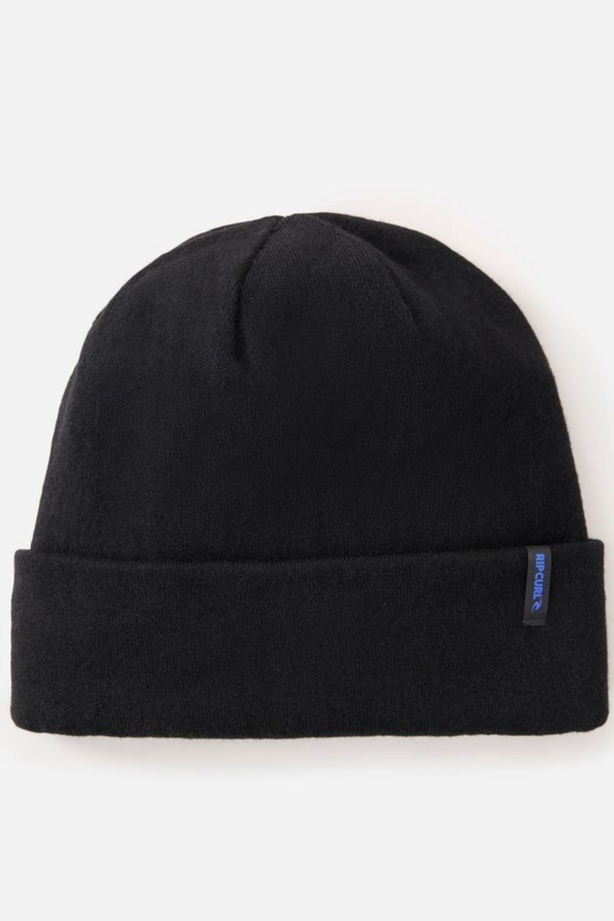 The Rip Curl Anti-Series Reg Tech Beanie is a plain black beanie with a folded brim and a small blue fabric tag, ideal for outdoor adventures. Shown against a white background.