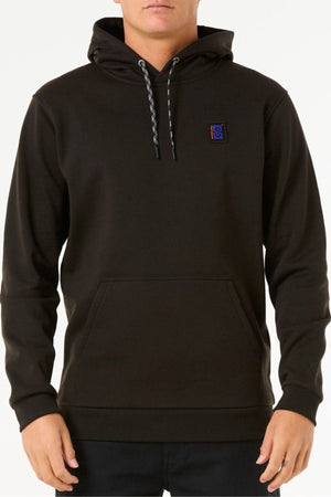 A person wears the black Rip Curl Anti Series Search Base Hood with a front pocket, black-and-white drawstrings, and a small square logo on the left chest. The water-repellent hoodie is shown against a plain white background.