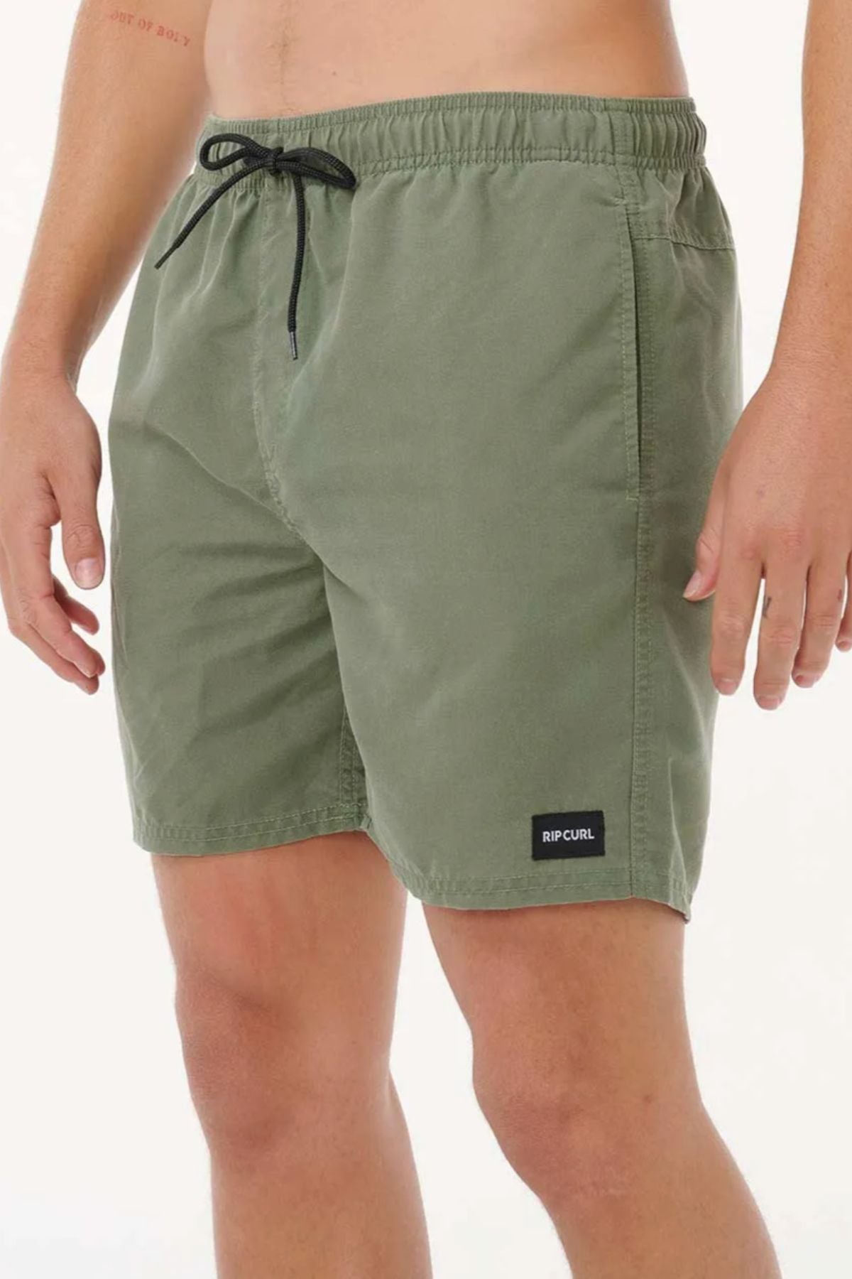 A person’s torso and legs are shown against a white background, wearing olive green Rip Curl Bondi Volley board shorts with a black drawstring, made from recycled PET.