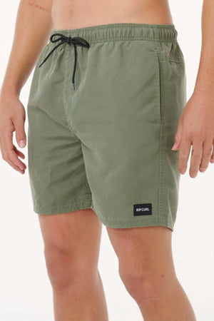 A person’s torso and legs are shown against a white background, wearing olive green Rip Curl Bondi Volley board shorts with a black drawstring, made from recycled PET.