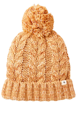 The Rip Curl Classic Regular Pom Pom Beanie in yellow-orange features a chunky cable pattern, folded brim, and large pom-pom, all crafted from soft acrylic yarn.