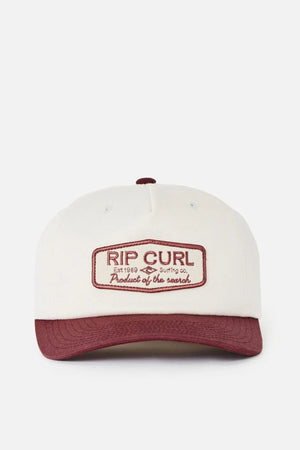 The Rip Curl Classic Surf SB Cap is a cream cotton snapback featuring a maroon brim and a front patch with “RIP CURL Est. 1969 Surfing Co. Product of the Search” in maroon text, combining classic design with laid-back surf culture style.