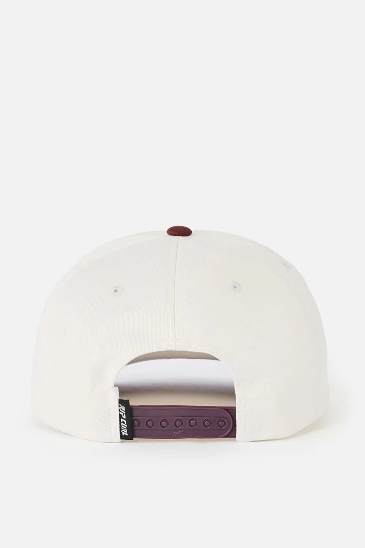 A view of the Rip Curl Classic Surf SB Cap from the back shows a white cotton snapback hat with a maroon adjustable snap closure and a small black tag on the left side. The top button is maroon, and the background is plain white.