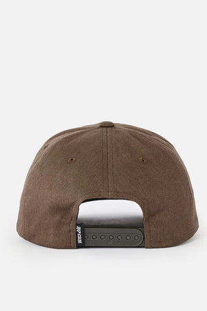 The Rip Curl Classic Surf SB Cap is a brown cotton snapback hat featured from the back, highlighting its adjustable black snapback closure and a small black tag on the left side—an ideal cap for relaxed, surf-inspired style.