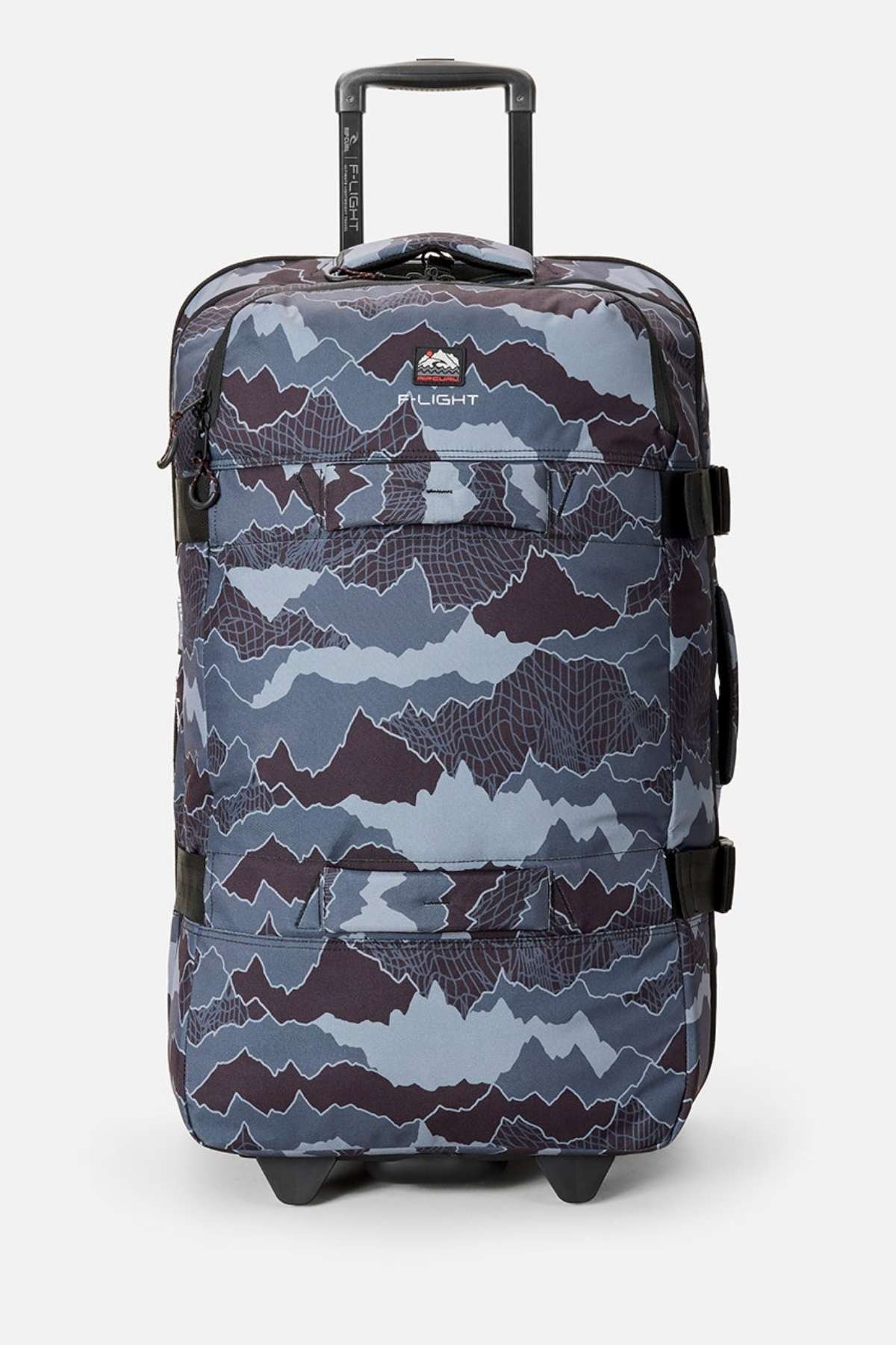 The Rip Curl F-Light Global 100L Search Camo Travel Bag with wheels, retractable handle, blue and gray camo pattern in recycled polyester, and black straps stands upright against a plain white background.