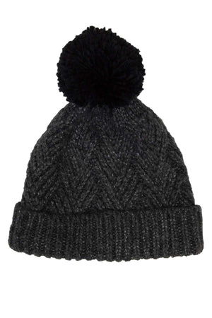 The Rip Curl Groundswell Pom Pom Beanie is a charcoal gray knit with a prominent contrast pom-pom on top. It boasts a zigzag texture, and the roll cuff hem enhances thickness and warmth.