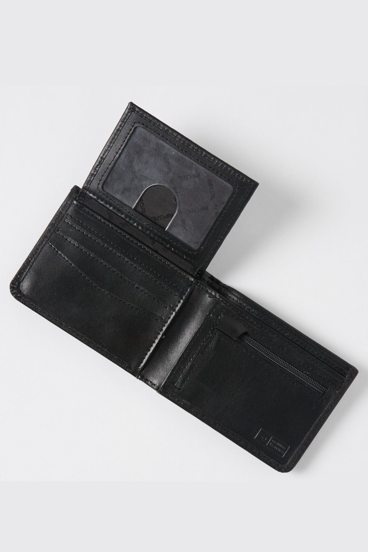 The Rip Curl Hi Rise RFID All Day Wallet is displayed open, revealing multiple card slots, a transparent ID window, and a zippered coin pocket. It features RFID protection and the Rip Curl logo against a light gray background.