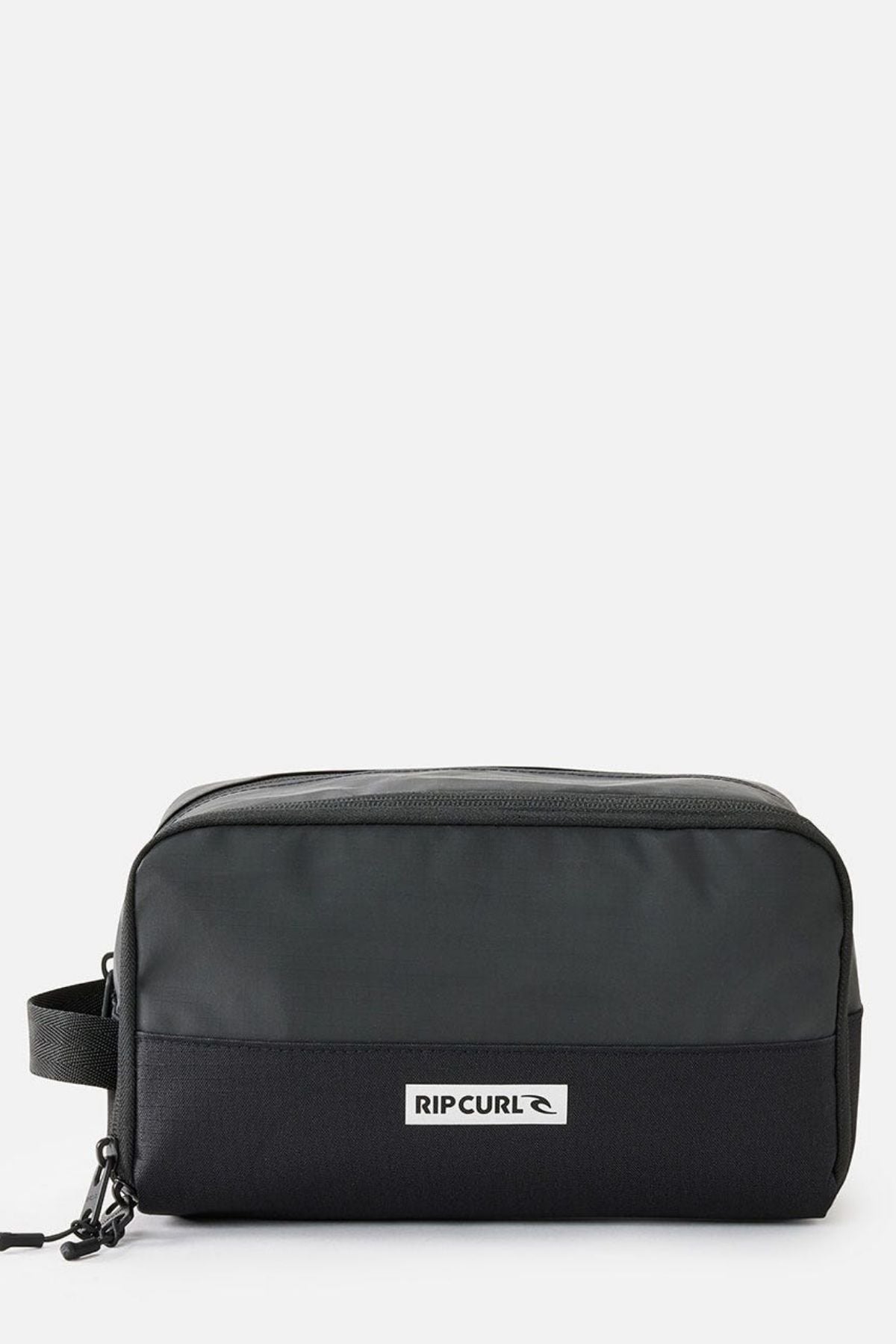 The Rip Curl Icons Groom Toiletry Bag, in black and dark gray, is perfect for travel. It features a zipper closure and a small side handle for easy organization. Adorned with a logo patch on the front, it seamlessly blends style with functionality.
